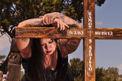 Sabrina Marie at her brother's grave in the Chilili, NM cemetery