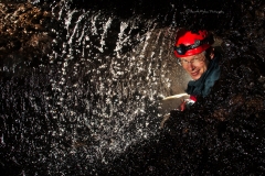Airidas behind the waterfall
